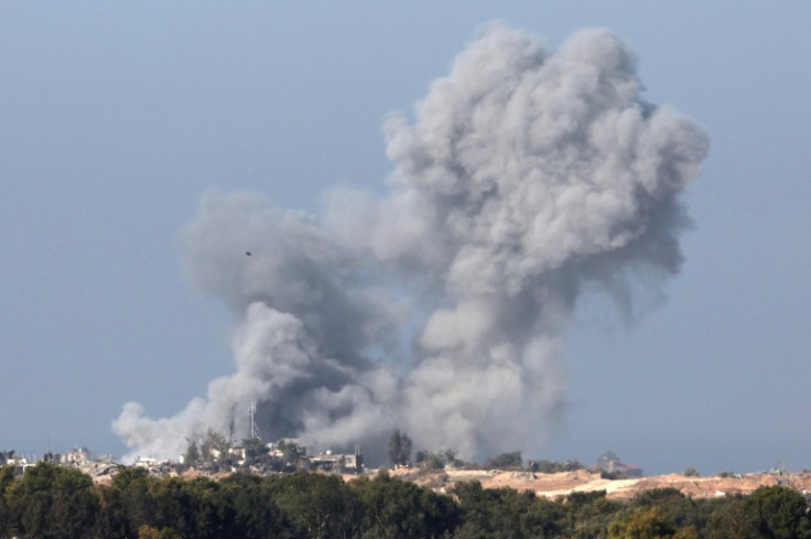 A picture taken from southern Israel near the border with the Gaza Strip on December 4, 2023, shows smoke billowing over the Palestinian territory following Israeli bombardment