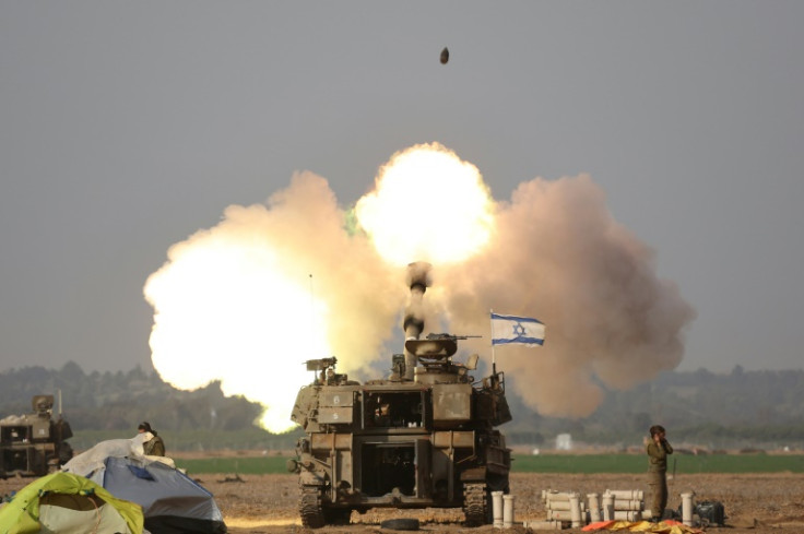 Israeli forces shell Gaza from the border area in southern Israel on December 12