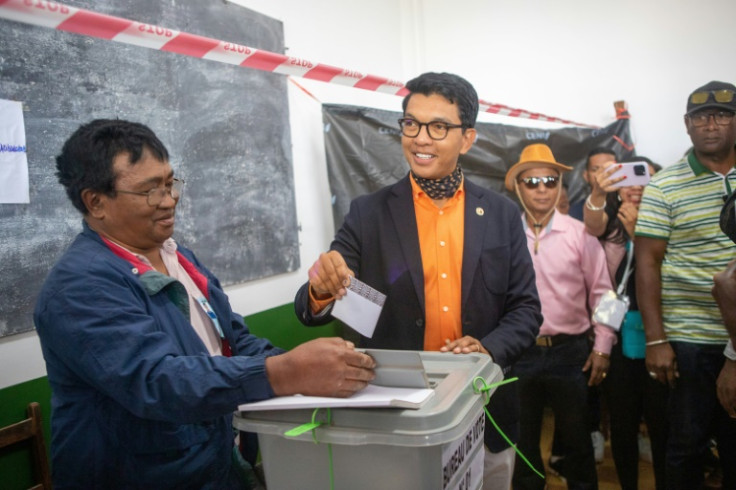 President Andry Rajoelina casts his ballot in Madagascar's national election clouded by opposition protests