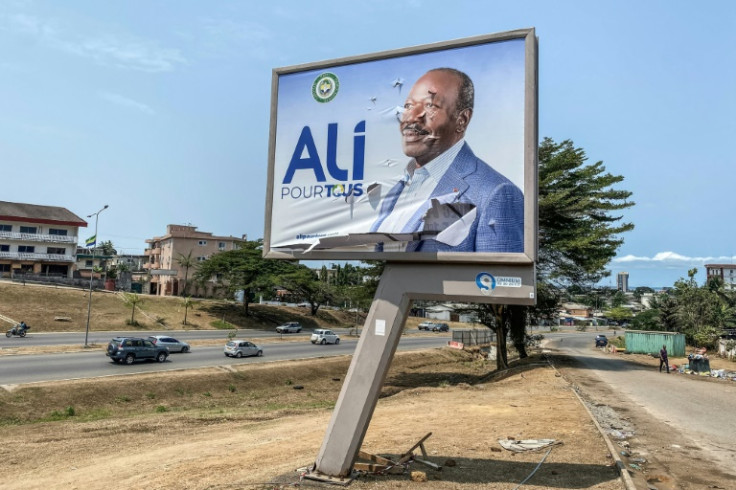 -- AFP PICTURES OF THE YEAR 2023 --A general view of a torn campaign billboard of ousted Gabon President Ali Bongo Ondimba in Libreville on August 31, 2023. People in the central African state of Gabon eagerly awaited a steer on their future on August 3