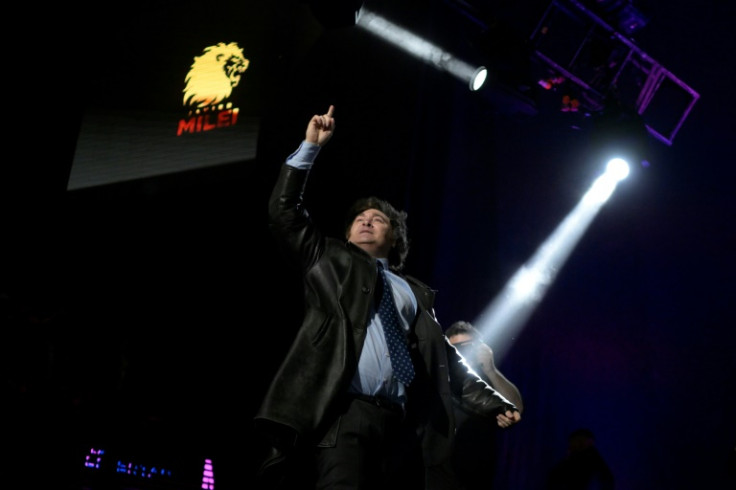 -- AFP PICTURES OF THE YEAR 2023 --Argentine congressman and presidential pre-candidate for La Libertad Avanza Alliance Javier Milei cheers at supporters at the end of the closing of his campaign for the August 13 primary elections, at the Movistar Aren