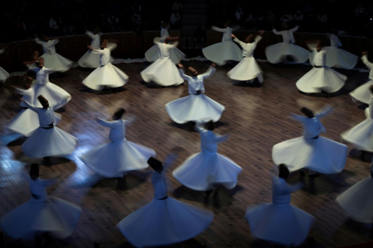 Whirling dervishes perform dances celebrating the teachings of mystic Sufi poet Rumi