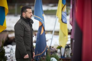 Ukrainian President Volodymyr Zelensky pays his respects at the graves of Ukrainian soldiers in Lviv