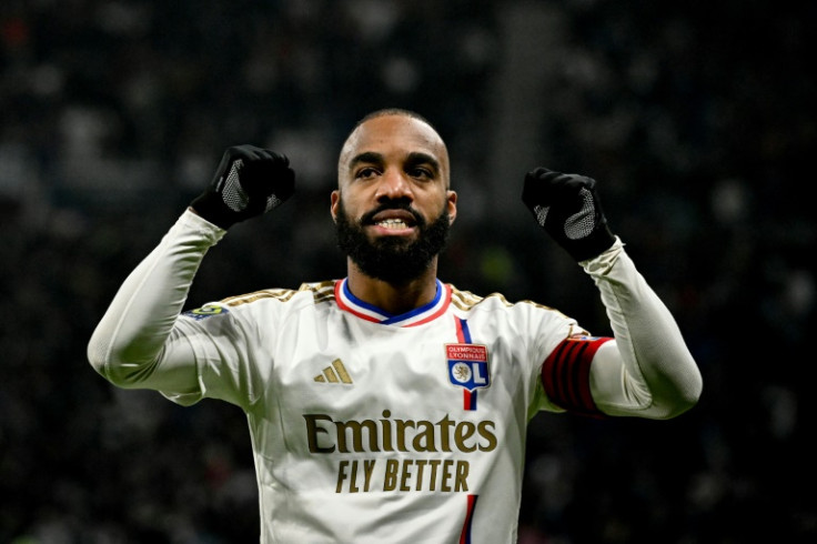 Alexandre Lacazette celebrates after scoring Lyon's winning goal against Nantes