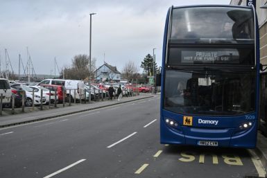 The migrants take a special bus to Weymouth