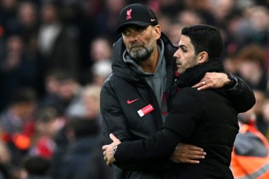 Liverpool manager Jurgen Klopp (left) and Arsenal boss Mikel Arteta are both aiming to top the Premier League charts at Christmas