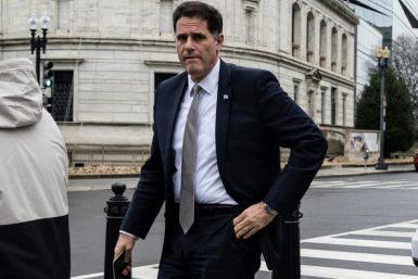 Israel's Minister for Strategic Affairs Ron Dermer walks into the Executive Office Building next to the White House on Tuesday