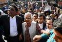 Bangladeshi Nobel peace laureate Muhammad Yunus (C) appears in a court in Dhaka on January 1, 2024. Yunus was facing six months in jail with a court set to rule on January 1 on a labour law case decried by his supporters as politically motivated.
