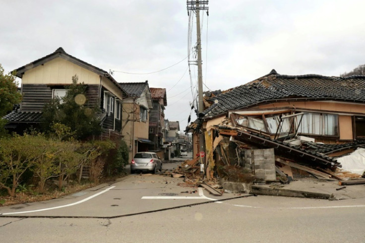 Buildings were damaged along a street in the Japanese city of Wajima