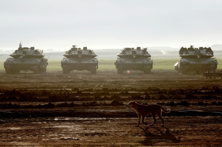 Israeli battle tanks are deployed along the border with the Gaza Strip and southern Israel on January 2, 2024