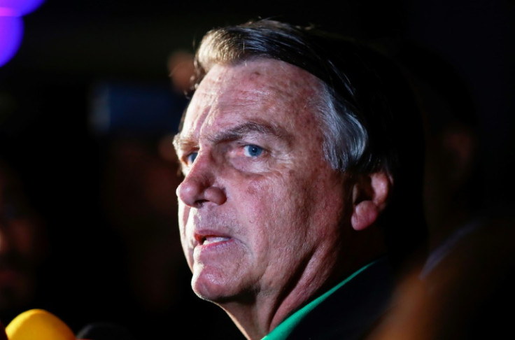 Brazil's former president Jair Bolsonaro denies involvement in the violent uprising in Brasilia by his supporters on January 8, 2023 after the far-right leader narrowly lost re-election to veteran leftist Luiz Inacio Lula da Silva