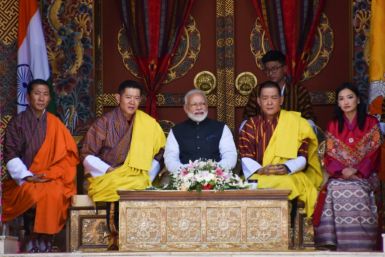 Indian Prime Minister Narendra Modi (C), Bhutan's King Jigme Khesar Namgyel Wangchuck (2L), the Fourth Druk Gyalpo (2R), Queen Jetsun Pema (R) and then prime minister Lotay Tshering (L) watch a cultural performance at the Tashichho Dzong during Modi's vis