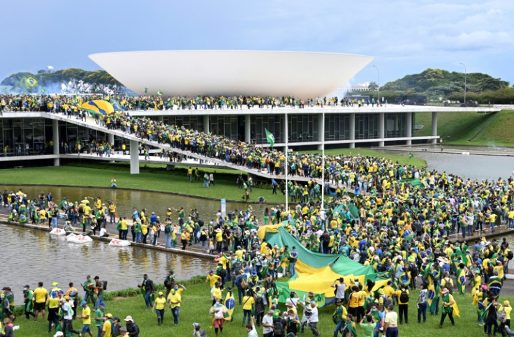 Supporters of Brazilian former President Jair Bolsonaro demonstrate at the Esplanada dos Ministerios in Brasilia on January 8, 2023