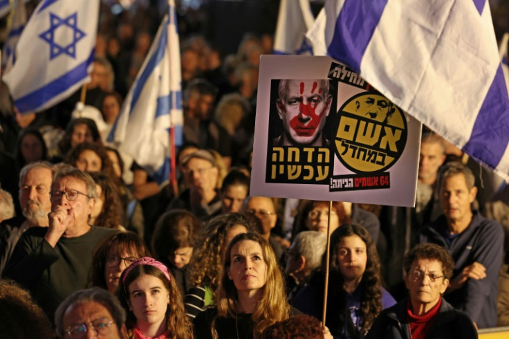Netanyahu was under growing pressure on Saturday with demonstrators gathering in Tel Aviv's Habima Square to call for early elections