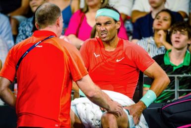 Spain's Rafael Nadal receives treatment for his hip at the Brisbane International