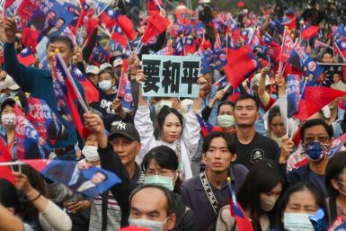Tens of thousands converged in southern Taiwan on Sunday for the rallies of three presidential candidates