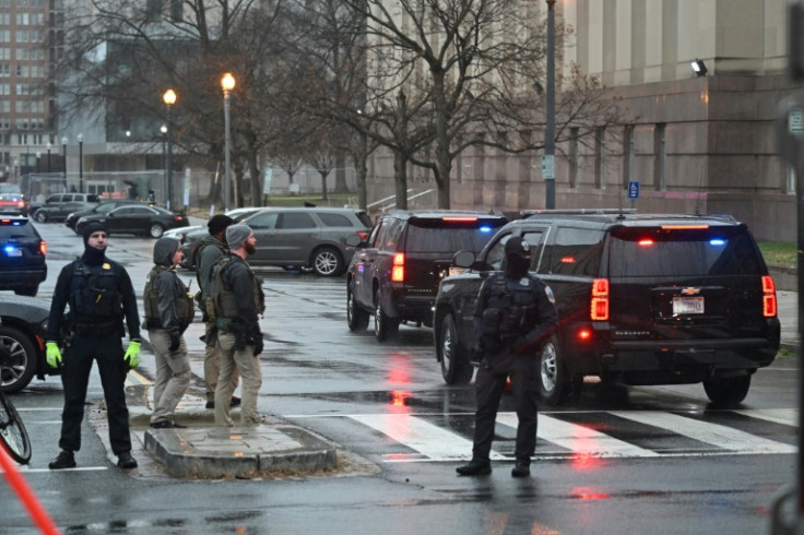 The motorcade with former US president Donald Trump arrives at federal court for a hearing regarding the extent of his presidential immunity