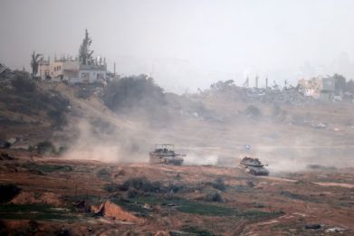Israeli army tanks in the central Gaza Strip on January 9, 2024