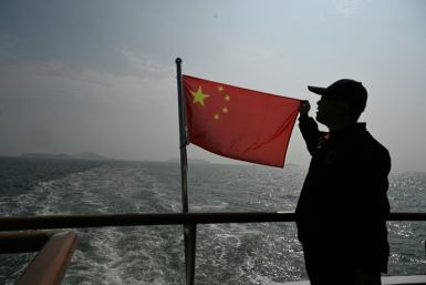 A Chinese man aboard a cruise past the Kinmen Islands on January 11, 2024, two days before Taiwan’s presidential election