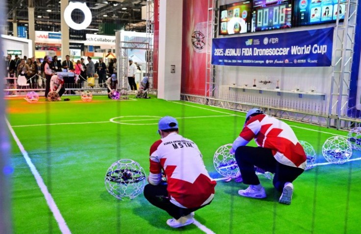 Competitors place their drones in position for drone soccer, a game first invented in 2016 by a South Korean engineer