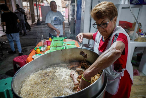 Maria del Pilar Cortes works at her taco restaurant in the Tepito neighborhood of Mexico City