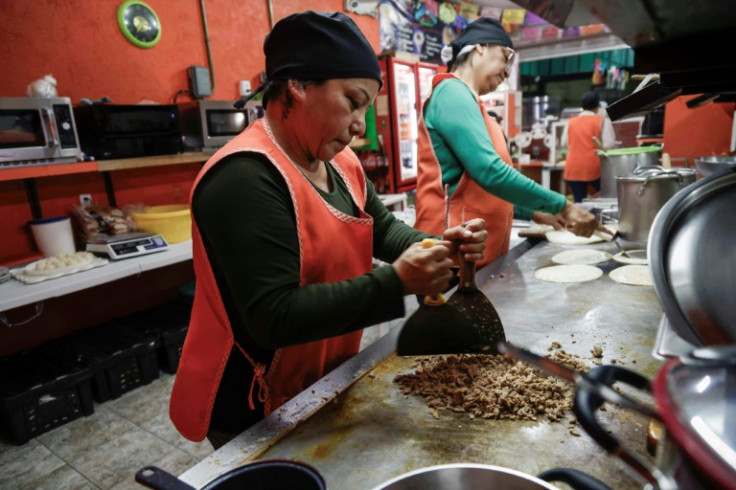 Women working at this taco restaurant in Mexico City have schedules that allow them to take their children to school