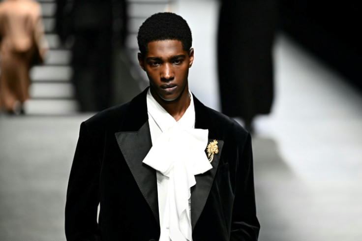 Lavalliere ties adorned razor-sharp tuxedos