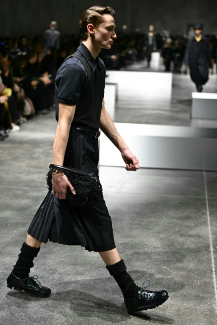 Breaking codes, men at the Fendi show wore checked skirts or long pleated shorts resembling kilts