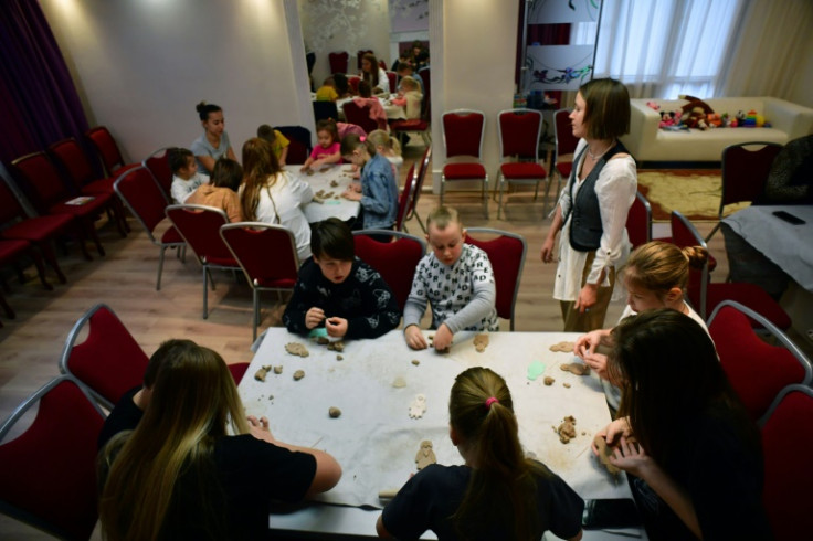 Activities are put on for the temporary residents of the hotel-shelter in Stary Oskol