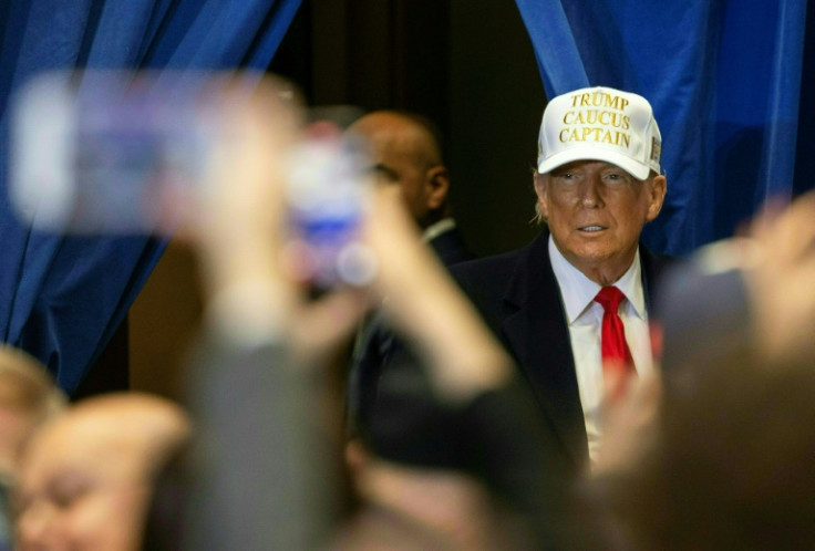 Donald Trump, seen here in Iowa on January 14, 2024, called on voters there to 'Save America'