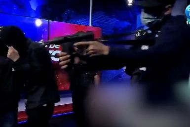 In one of the most dramatic scenes of the Ecuador crisis, masked gunmen stormed a live television broadcast, firing off shots and forcing the crew to the ground as they begged for their lives