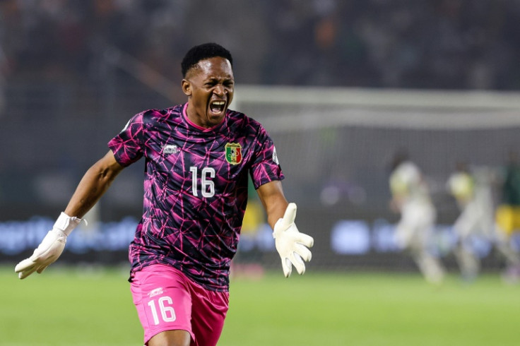 Goalkeeper Djigui Diarra celebrates a Mali goal against South Africa