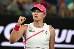 Iga Swiatek celebrates after beating Danielle Collins in the Australian Open second round