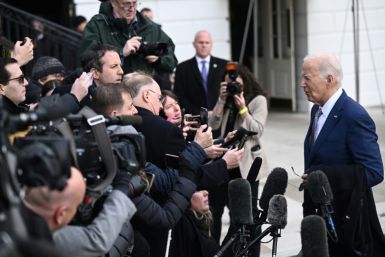 US President Joe Biden speaks to reporters before boarding Marine One on the South Lawn of the White House
