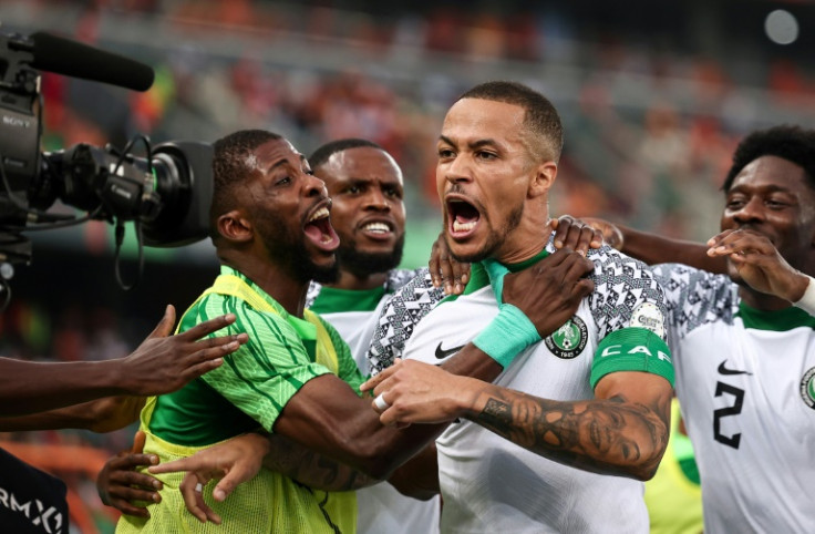 William Troost-Ekong (C) celebrates after scoring a penalty for Nigeria against Ivory Coast