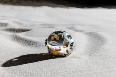 The transformable lunar surface robot, or "SORA-Q", is meant to move about the Moon's surface, sending photos to earth