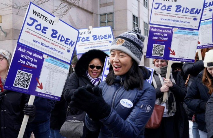 Boston Mayor Michelle Wu joins supporters demonstrating at a Joe Biden Write-In Rally in Manchester, New Hampshire, on January 20, 2024