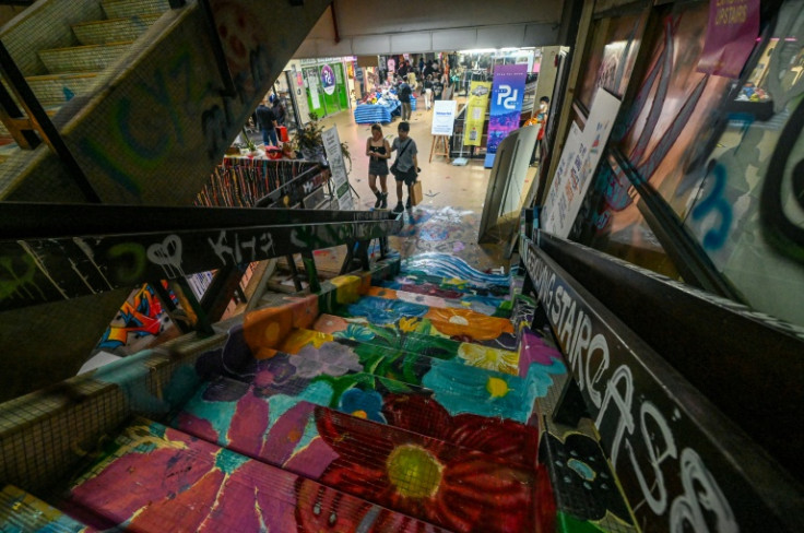 Young creatives have taken over an abandoned mall in Singapore, spray painting colourful murals and holding art workshops