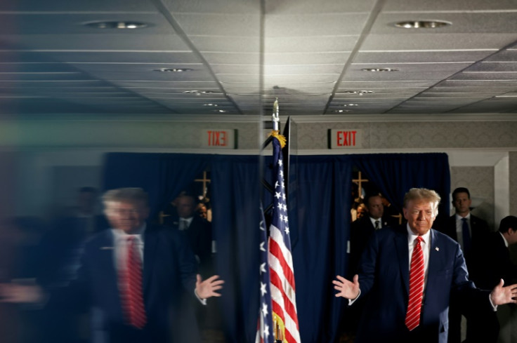 Donald Trump arrives for a campaign rally in the basement ballroom of The Margate Resort on January 22, 2024 in Laconia, New Hampshire