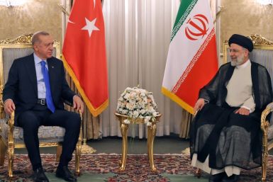 Turkish President Recep Tayyip Erdogan (L) visited Iranian counterpart Ebrahim Raisi in Tehran in 2022