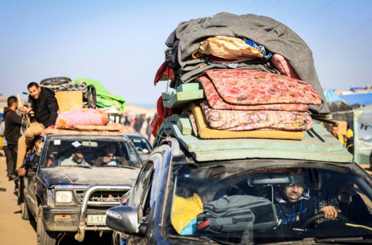 Palestinian families fleeing Khan Yunis on the coastal road leading to Rafah on January 22, 2024