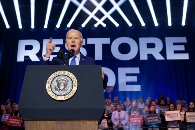 US President Joe Biden was not in New Hampshire during the state's primary, but he was campaigning in Virginia -- and hitting out at his likely 2024 election rival Donald Trump