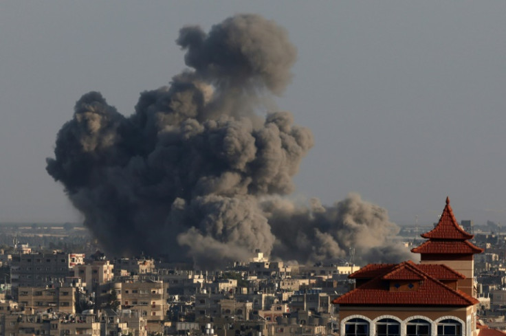 Smoke billows over Khan Yunis in the southern Gaza Strip during an Israeli bombardment