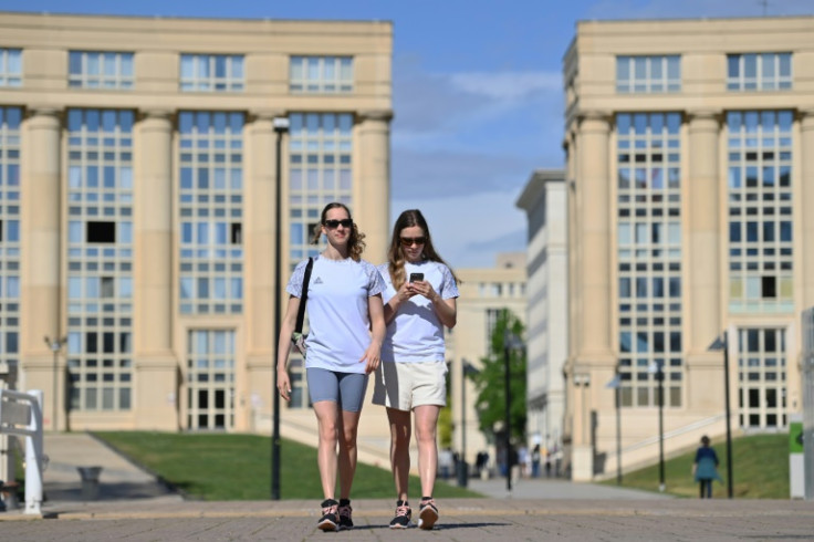 The Aleksiiva twins relax after winning the gold in the World Aquatics Cup in Montpellier, France in May