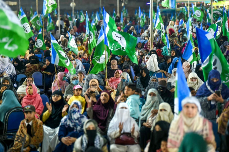 Jamaat-e-Islami Pakistan party supporters attend a campaign rally in Karachi on January 28