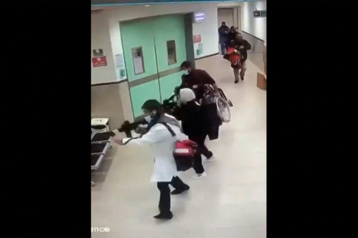 CCTV footage said to be from the Ibn Sina Hospital purports to show armed Israeli undercover agents moving through its corridors