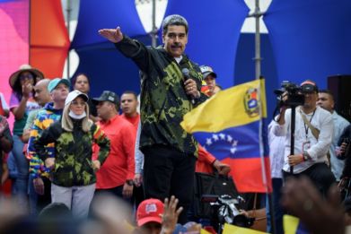 Venezuelan President Nicolas Maduro greets supporters during a rally in Caracas on January 23, 2024