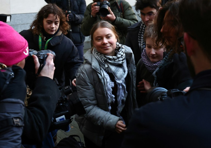 Greta Thunberg (C) and other climate activists appeared at Westminster Magistrates Court in London on Thursday