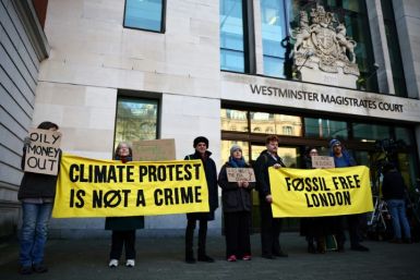 Greenpeace said activists protested peacefully against oil executives 'making billions from climate-wrecking fossil fuels'