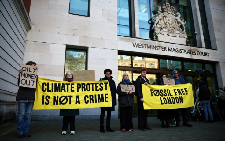 Greenpeace said activists protested peacefully against oil executives 'making billions from climate-wrecking fossil fuels'